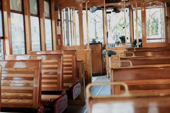 trolley with brass handrails